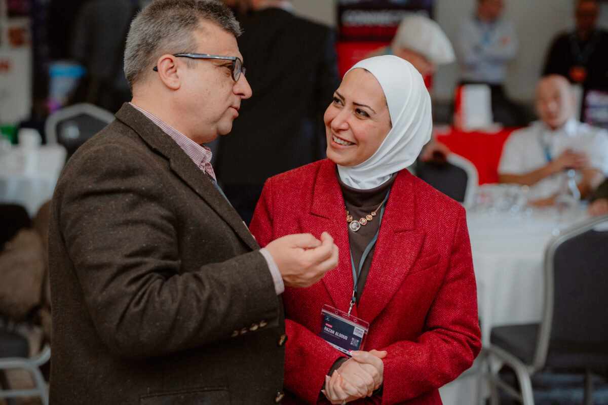 Man and woman in conversation and smiling